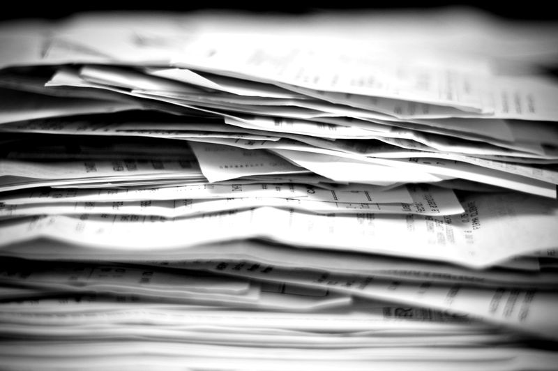 Stack of paper invoices