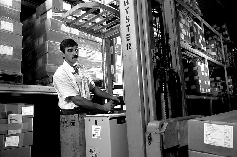 Warehouse worker at a forklift