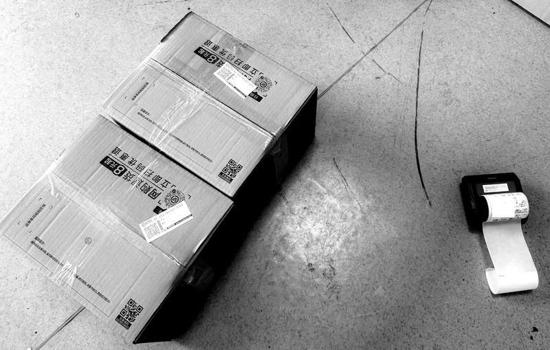 Parcel boxes and a label printer
