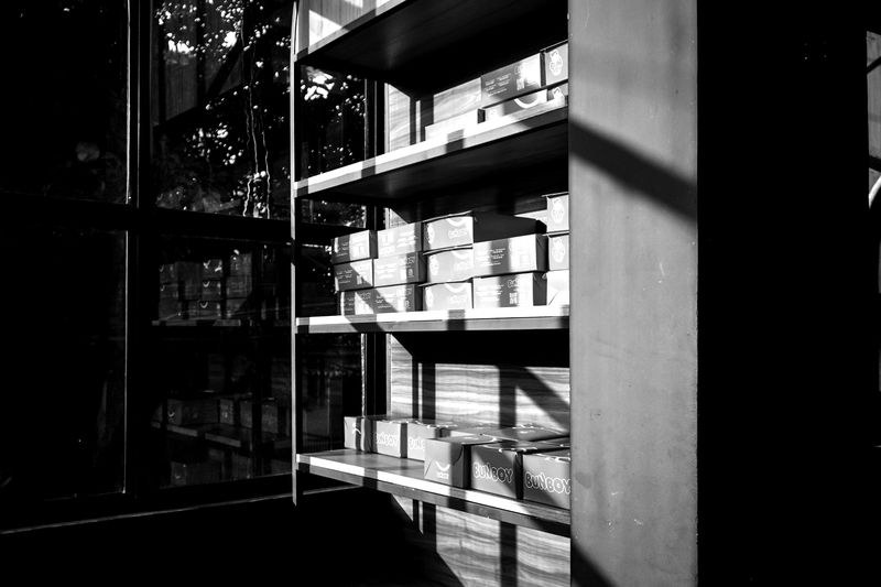 Shelves with product boxes in a stockroom